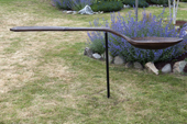 Spoonful - cast bronze, 8' long x 1 1/2' at widest point
